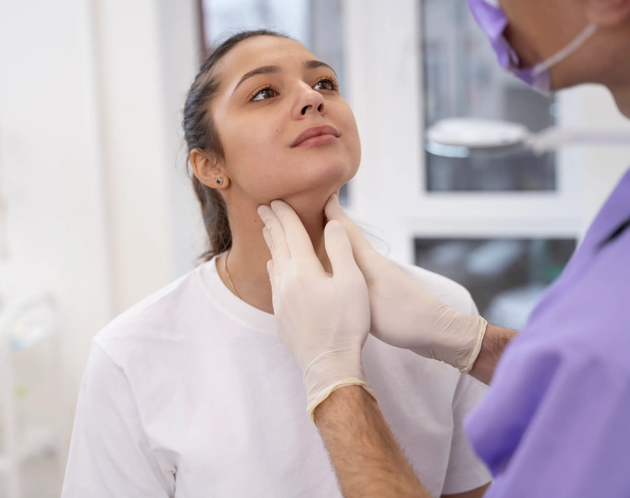 Doctor examining a patient during a routine check-up